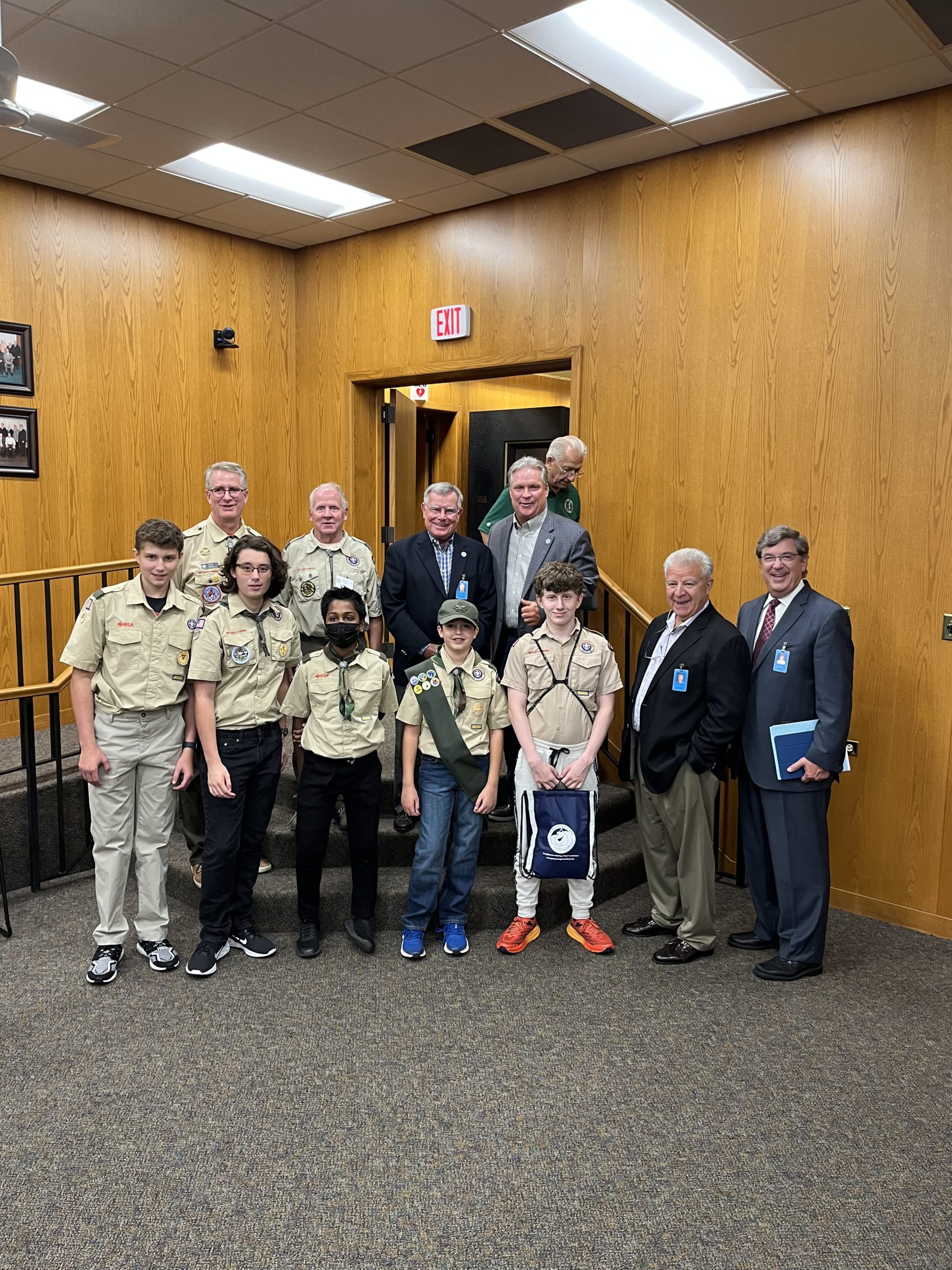 boy scouts posing for a picture with Commissioners